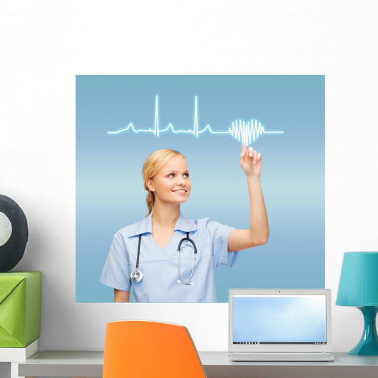 smiling doctor or nurse pointing to cardiogram Wall Mural