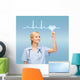 smiling doctor or nurse pointing to cardiogram Wall Mural