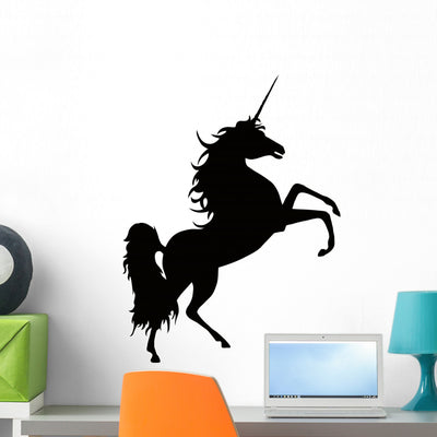 Elegant Black Unicorn Silhouette Wall Decal shown on a wall