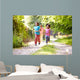 Children Running In Countryside With Father 