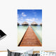 tropical beach: tropical resort and cloudy sky Wall Mural