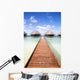 tropical beach: tropical resort and cloudy sky Wall Mural