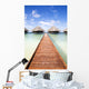 tropical beach: tropical resort and cloudy sky Wall Mural