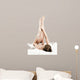 Woman massaging legs lying on white background 