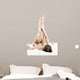 Woman massaging legs lying on white background 