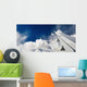 Airplane wing and blue sky Wall Mural