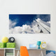 Airplane wing and blue sky Wall Mural