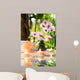 massage composition spa with candles, orchids, stones in garden Wall Mural
