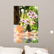 massage composition spa with candles, orchids, stones in garden Wall Mural