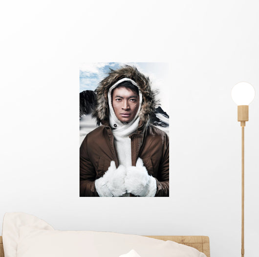 Asian winter sport fashion man in snow mountain landscape. Weari 