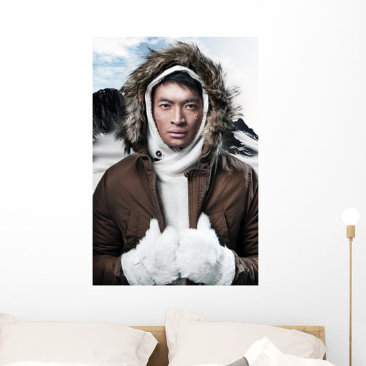 Asian winter sport fashion man in snow mountain landscape. Weari 
