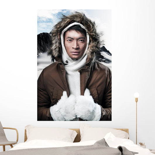 Asian winter sport fashion man in snow mountain landscape. Weari 