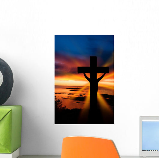 A cross at sundown on the ocean Wall Mural