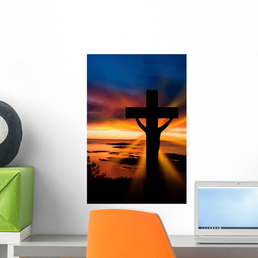 A cross at sundown on the ocean Wall Mural