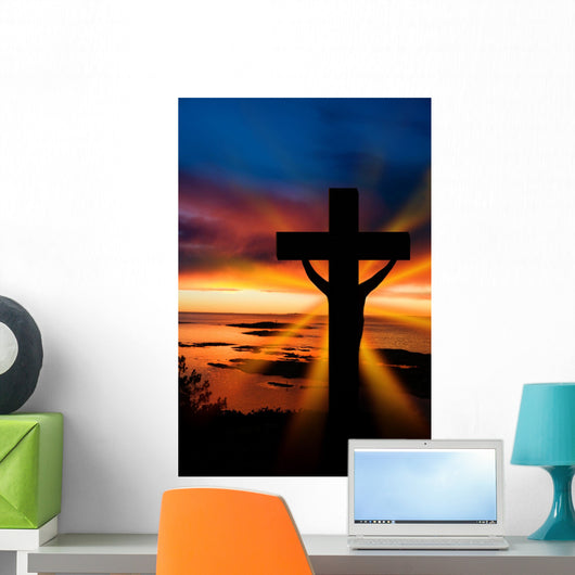 A cross at sundown on the ocean Wall Mural