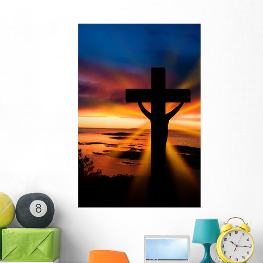 A cross at sundown on the ocean Wall Mural
