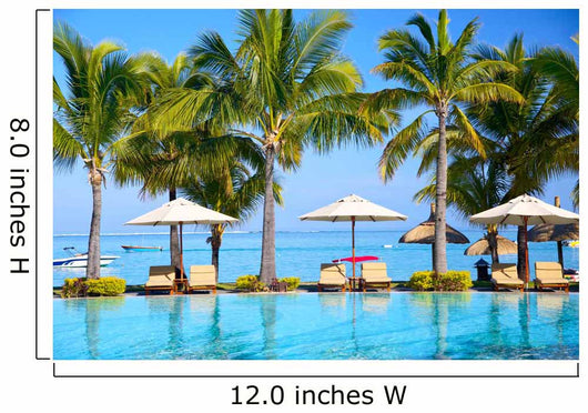 Swimming pool with  umbrellas on beach in Mauritius Wall Mural