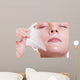 Portrait blond girl in facial mask. Beauty and skin care. 