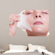 Portrait blond girl in facial mask. Beauty and skin care. 