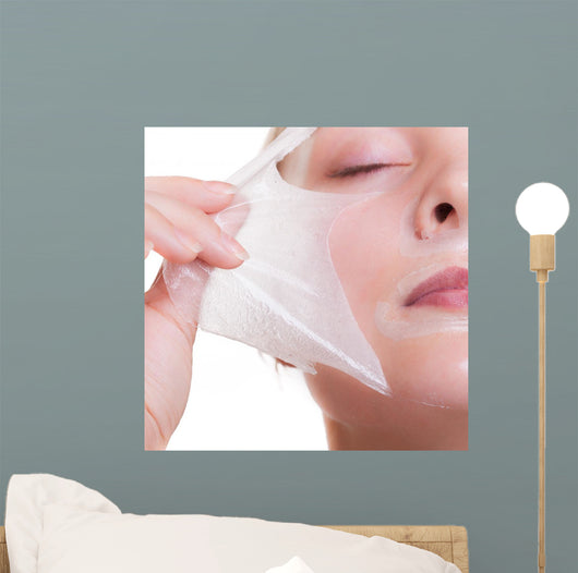 Portrait blond girl in facial mask. Part face. Beauty skin care. 