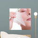 Portrait blond girl in facial mask. Part face. Beauty skin care. 