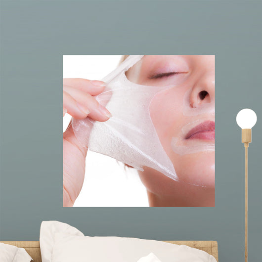Portrait blond girl in facial mask. Part face. Beauty skin care. 