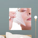 Portrait blond girl in facial mask. Part face. Beauty skin care. 