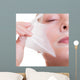 Portrait blond girl in facial mask. Part face. Beauty skin care. 