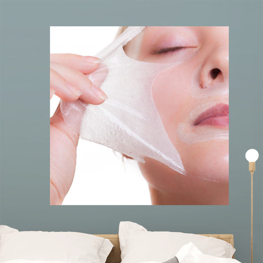 Portrait blond girl in facial mask. Part face. Beauty skin care. 