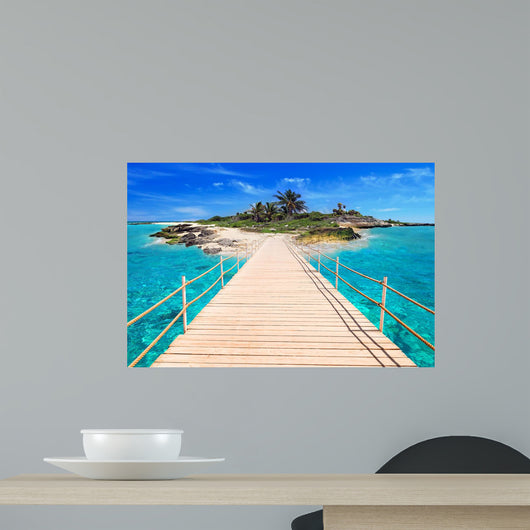 Pier to the tropical island of Caribbean Sea 