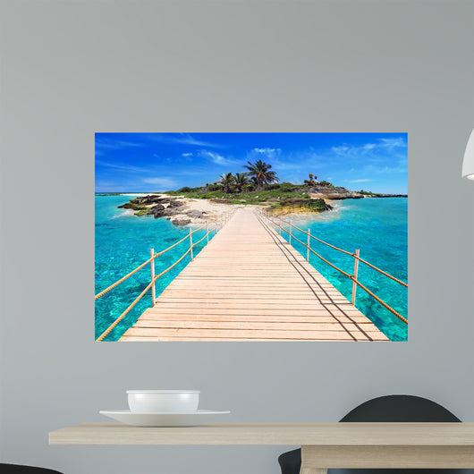 Pier to the tropical island of Caribbean Sea 