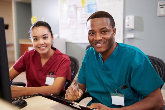 Male and Female Nurse Working 