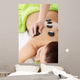 Beautiful woman lying on spa salon. 
