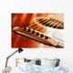 Acoustic guitar bridge and strings close up Wall Mural