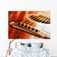 Acoustic guitar bridge and strings close up Wall Mural