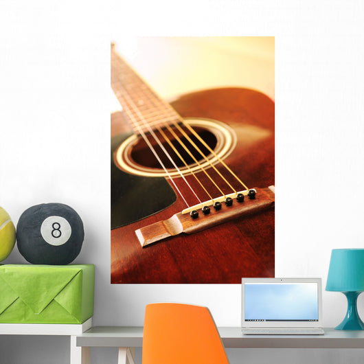 Musical instrument acoustic guitar close up in perspective Wall Mural