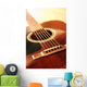 Musical instrument acoustic guitar close up in perspective Wall Mural