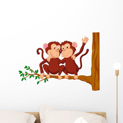 Two Monkeys Sitting Tree Wall Decal shown on a wall