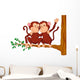 Two monkeys sitting on a tree Wall Decal