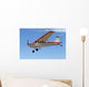 Cessna 180 coming in to land Wall Mural