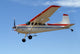 Cessna 180 coming in to land Wall Mural