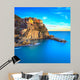 Manarola village, rocks and sea at sunset. Cinque Terre, Italy 