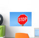 Stop sign on a road Wall Mural