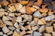 Dry Chopped Firewood Logs in a Pile 