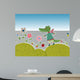 Little crocodile walking on flowering meadow Wall Mural