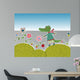 Little crocodile walking on flowering meadow Wall Mural