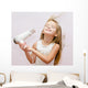 Cute Smiling Little Girl Dries Hair 