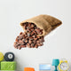 Cocoa beans in bag isolated on white Wall Decal