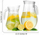Cold water with lime, lemon and ice in pitchers isolated 