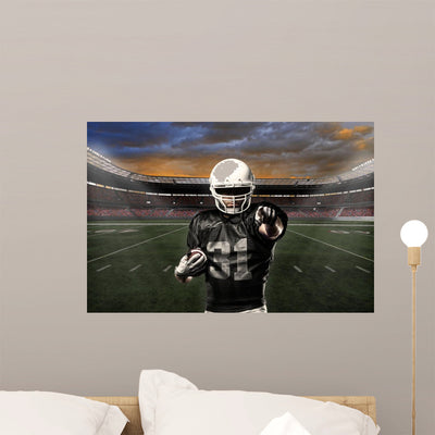 Football Player shown on a wall